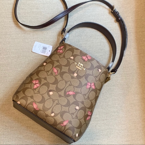 small town bucket bag in signature canvas with butterfly print